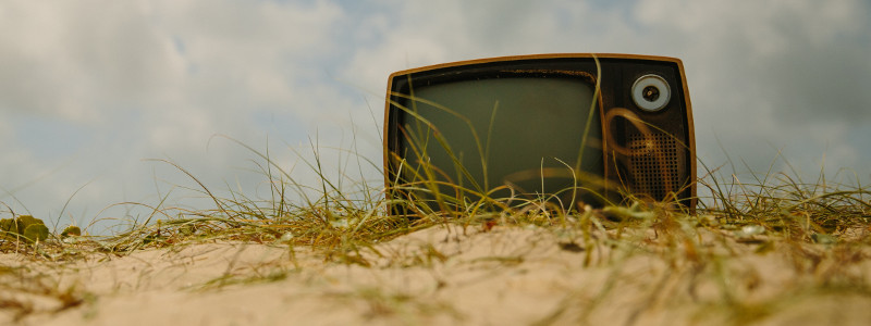 Old TV in field